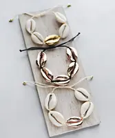 

Artilady Natural Cowrie Shell Bracelets Handmade Boho White Seashell Bracelet for Women Summer Beach Jewelry Gift Party