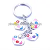 creative cosmetic wholesale keychain charms,metal custom keychain as gifts
