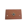 Nice price custom brown color embossing brand name logo jeans pu patch labels for garments