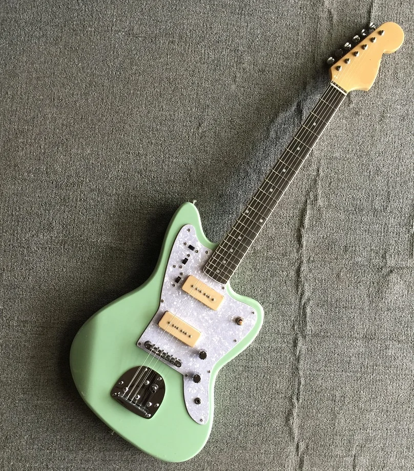 

Weifang Rebon seafoam green electric guitar