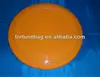 Orange plastic flying ring frisbee