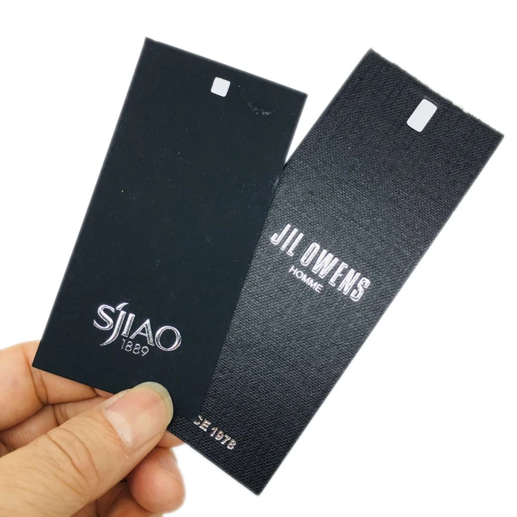 

Customized Printed Garment Labels Logo Friendly Recycled Clothing Paper Swing Hang Tags With Plastic Seal Tag Price Clothes Tag, Customized color