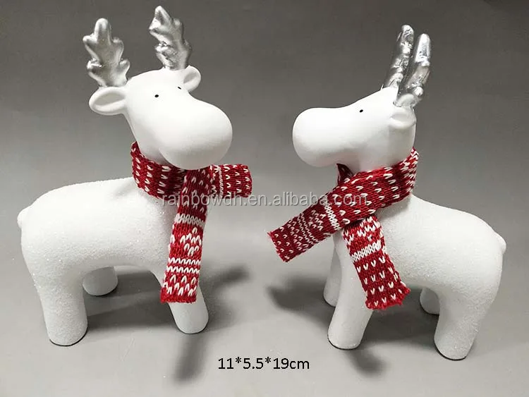 white ceramic reindeer figurine