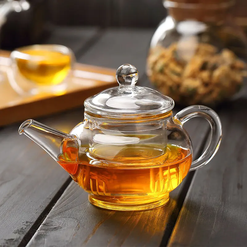 small glass tea kettle