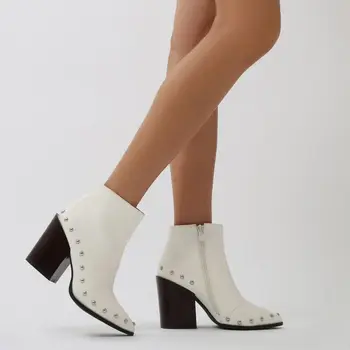 white faux leather ankle boots