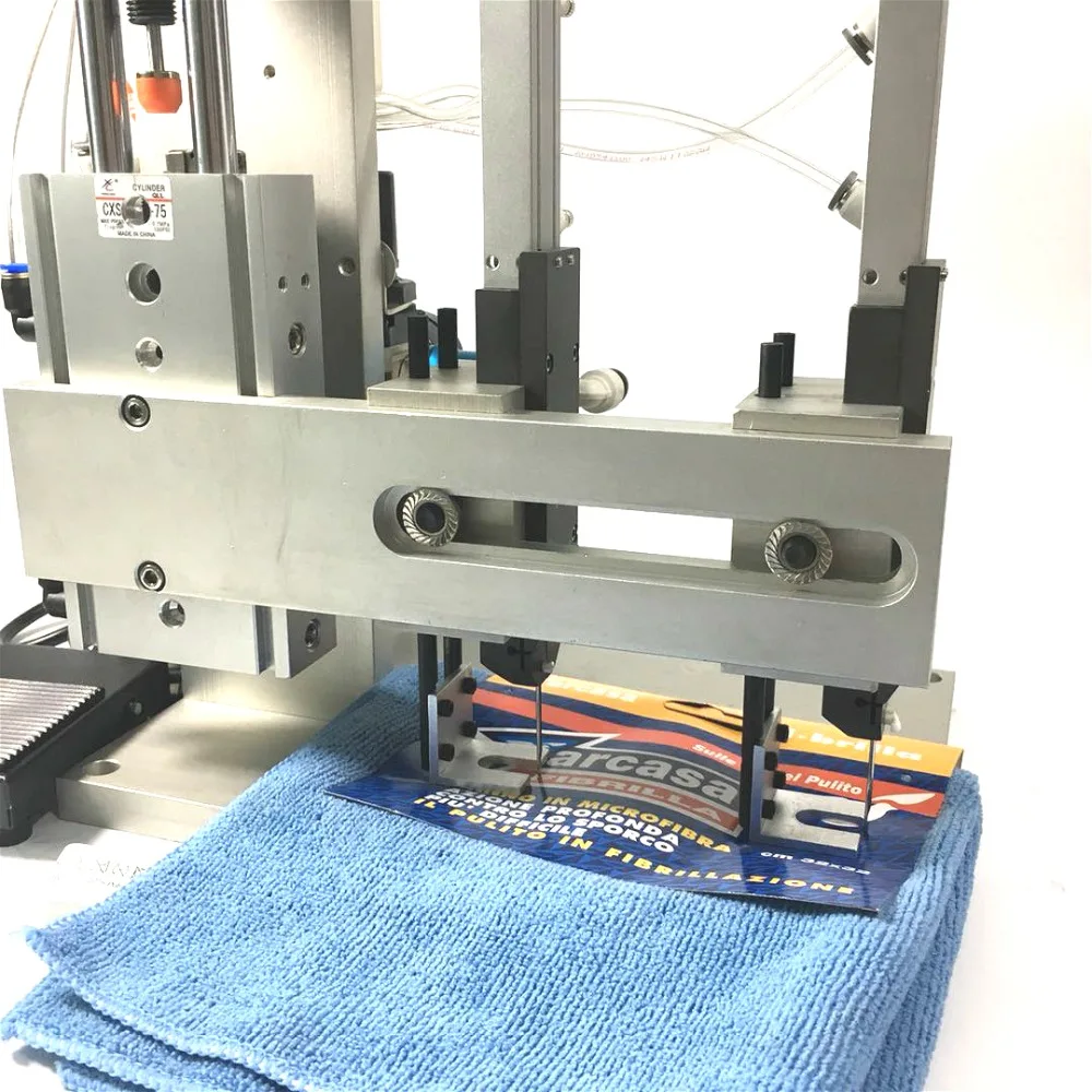 
TM 5210 Microfiber Towels Tagging Machine For cleaning Towels 