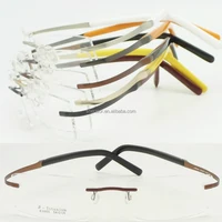 

wholesales E1053 ultra lightweight pure titanium with hingeless bendable temple rectangle rimless optical glasses frame