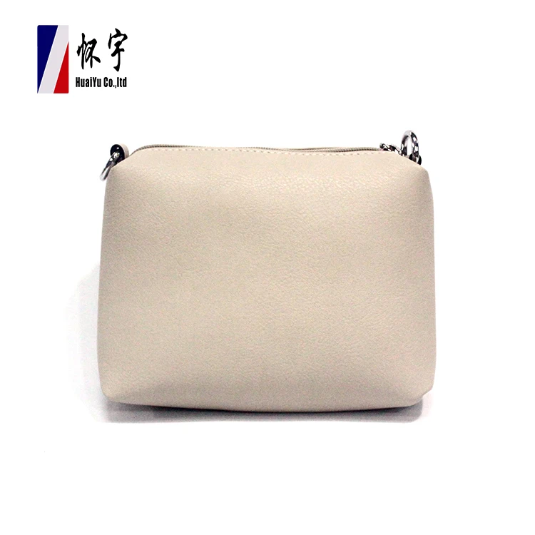 white shoulder strap purse