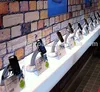 Mobile phone store interior design wood display wall shelving and table display