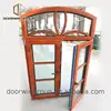 Orlando Arched window that open outward and has half round arch grille design