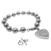 Olivia Popular Design Custom Engraved "A Mother Understands What A Child Does Not Say" Mom Heart Charm Toggle Bracelet Silver