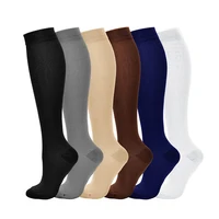 

Wholesale Custom China Running Athletic Knee High Solid Compression Socks for Women and Men