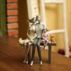 A family of three sculpture resin decorative pieces home decoration