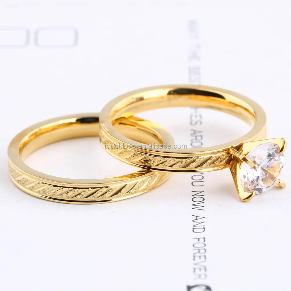 

stainless steel gold plated wedding ring set