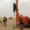 Electrical start diesel engine solar pile driver with attachment for post sheet pile