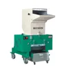 Low speed grinder for plastic size reduction