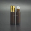 Empty 10ml Amber frosted Glass Roll On Bottles with essential oil and perfume oil