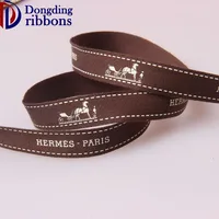 

Custom saddle stitched 2cm brown printed linen cotton ribbon