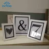 Intco white and black design waterproof wood picture frame
