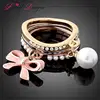Factory direct sale customized pink bowknot pendant ring fashion pearl crystal setting gold finger ring