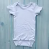 Wholesale solid color infant rompers boutique 100% cotton baby onesie unisex soft jumpsuit for newborn