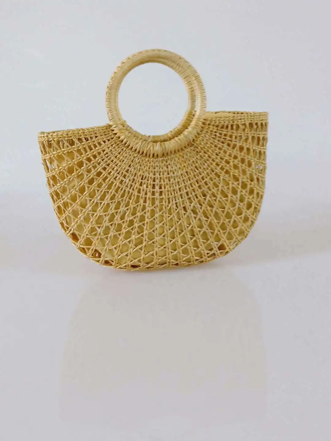 half moon rattan bag