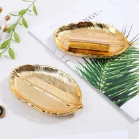 

golden leaf shape trinket dish for Ceramic key Jewelry Plate
