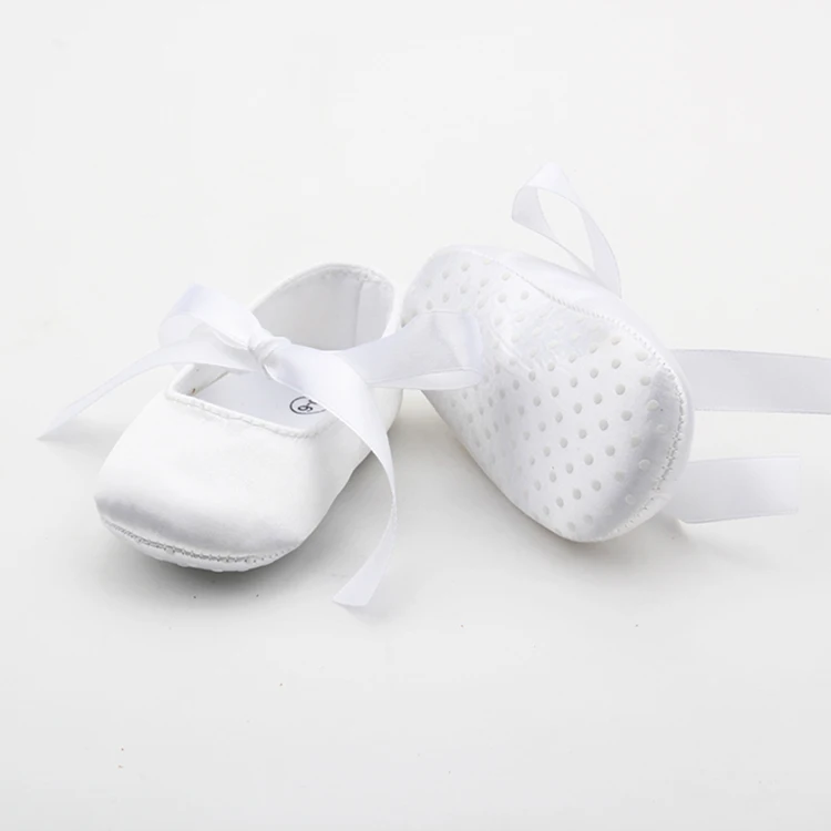 white satin baby shoes