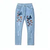 2018 hot sale rubber print hand brush new pattern latest design ladies jeans pants