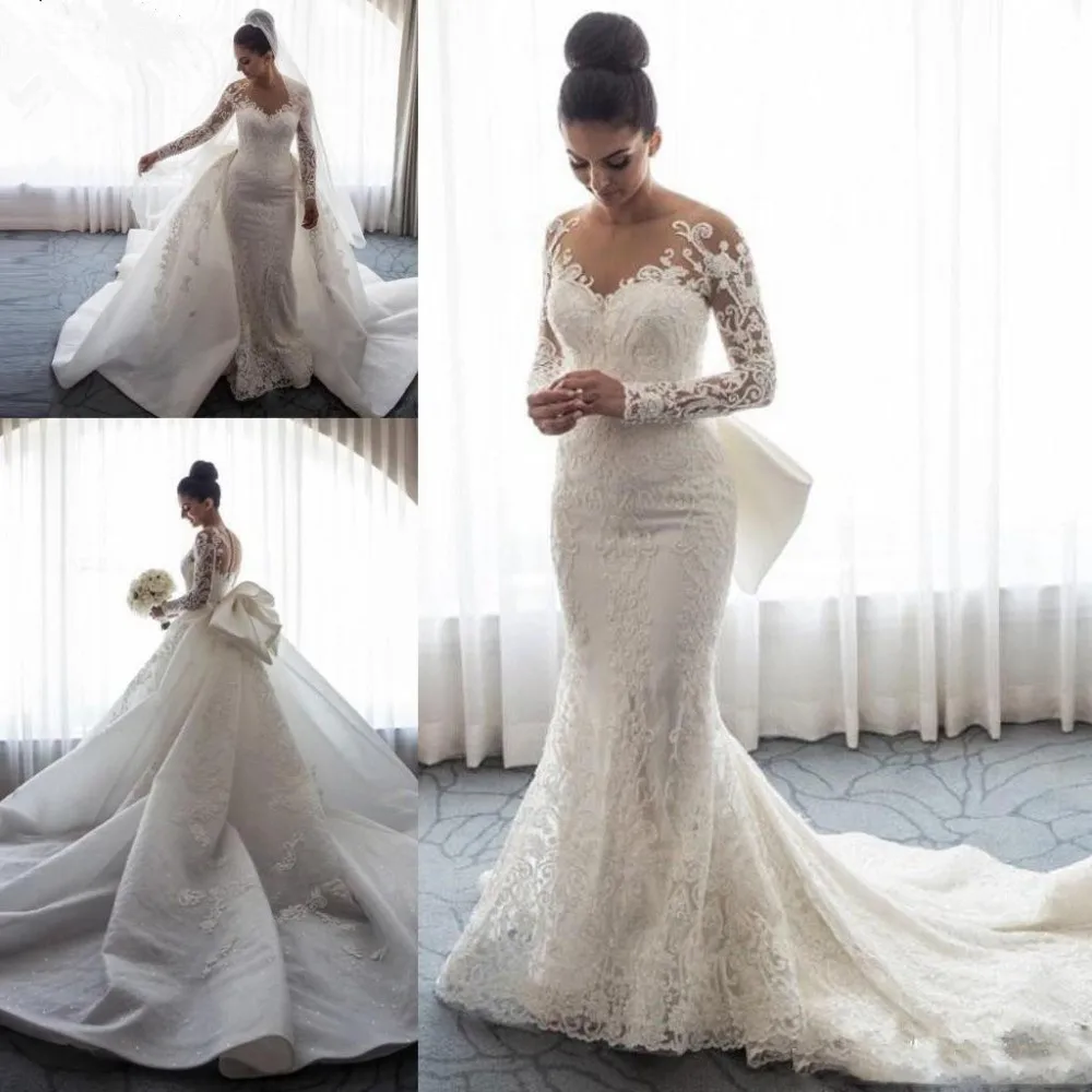 

2019 Luxury Mermaid Wedding Dress Sheer Neck Long Sleeves Lace Applique Bow Overskirts Chapel Train Bride Dress Vestido de noiva