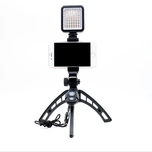 Creative desktop mobile live tripod Handheld selfie camera Portable sports camera stand tiktok anti-shake folding universal hand