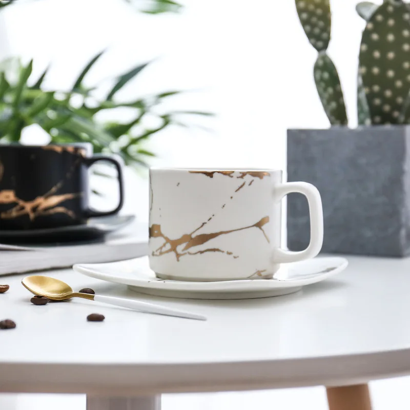Ceramic coffee cup with gilt edge.jpg