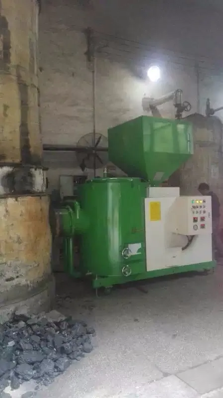 Biomass brner connected the boiler.JPG