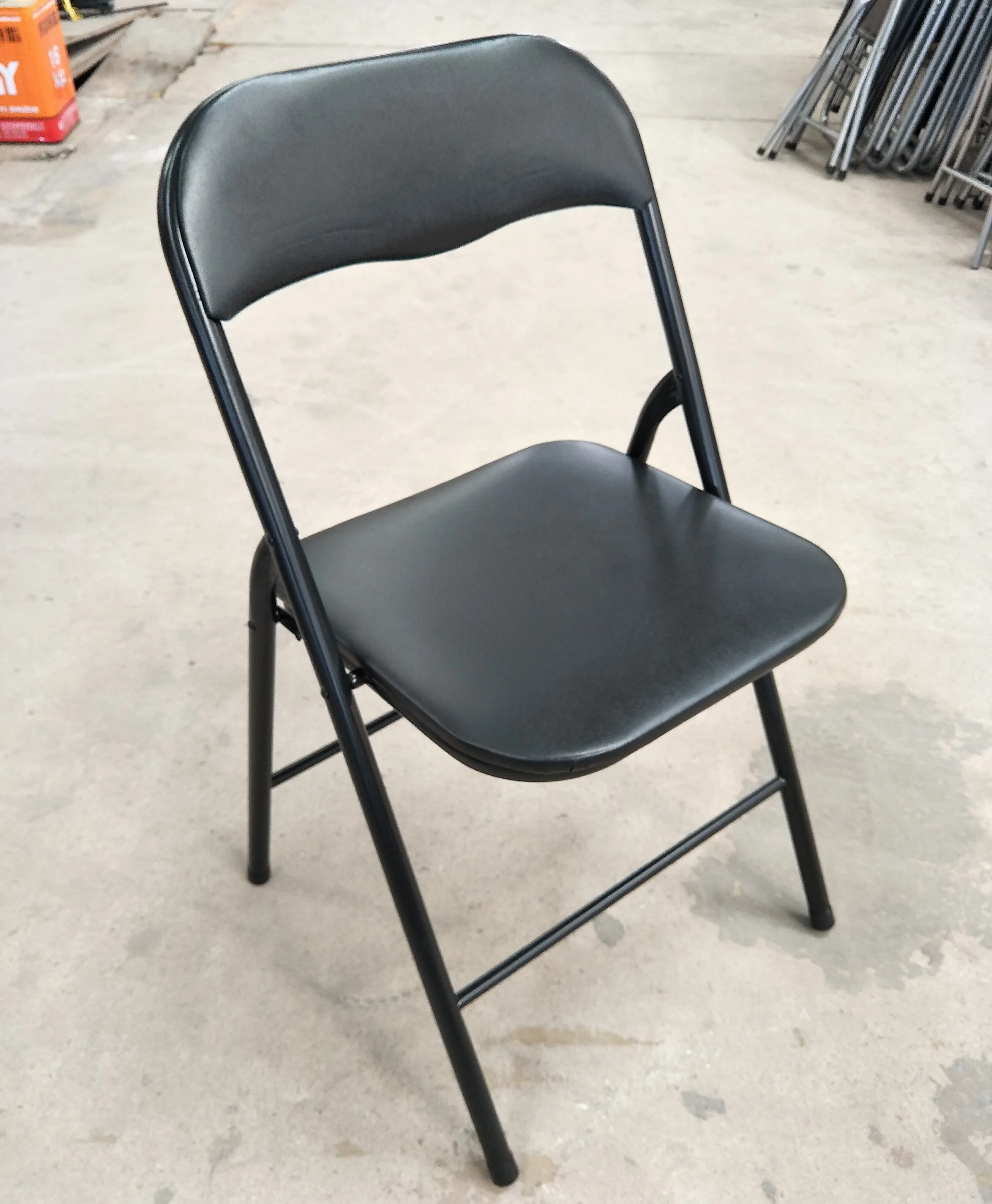 
Steel Tube Folding Chair With PVC and Foam Padded Seat 