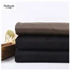 China supplier polyester bonded synthetic wool lamb faux fur suede fabric for coat and garments