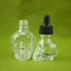 China suppliers cheap 30ml skull head glass dropper bottle for e liquid essential oil
