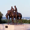 large outdoor monument sculptures metal craft bronze horse statue and two man