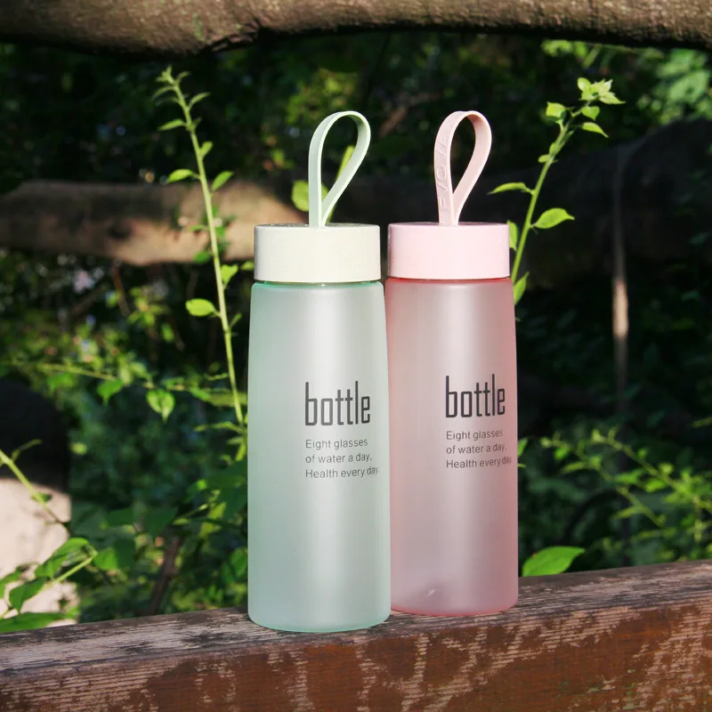 Eco-friendly 520ml frosted glass water bottle with rope water bottle wholesale
