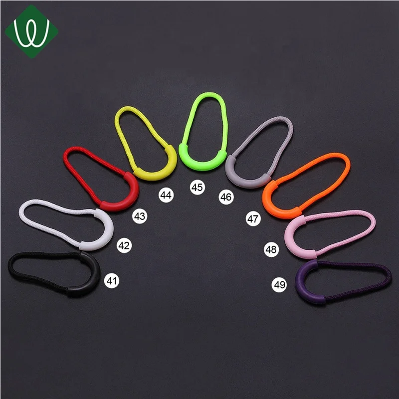 

High Quality Nylon Pulls Custom Common Use Design Soft Rubber Embossed PVC Zipper Pullers for Bags