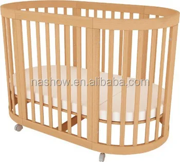 round wooden cot