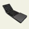 Three-fold bluetooth keyboard with round keycap with touchpad