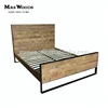 Reclaimed wood and metal powder coated rustic industrial bed frame