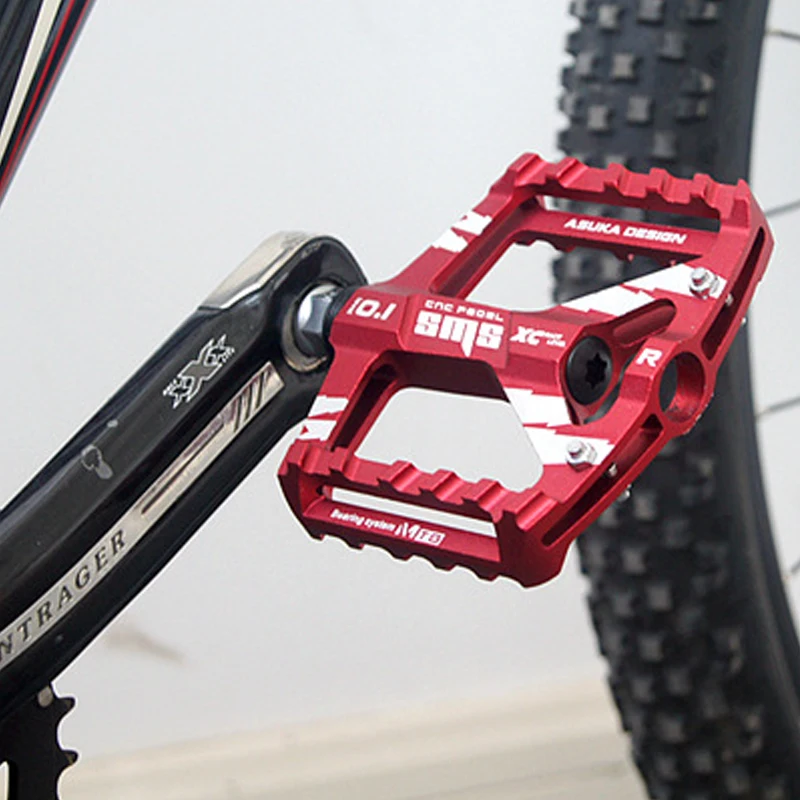 red bike pedals