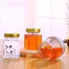 Hot sale spot products High quality round and hexagon shape glass jar for honey jam with lid