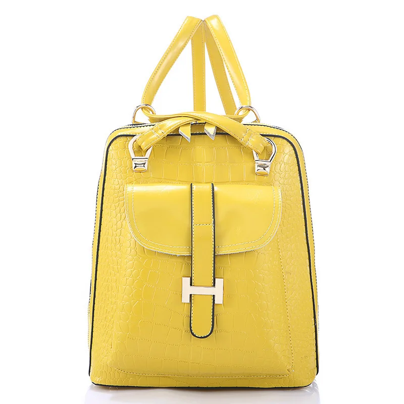 yellow leather backpack purse