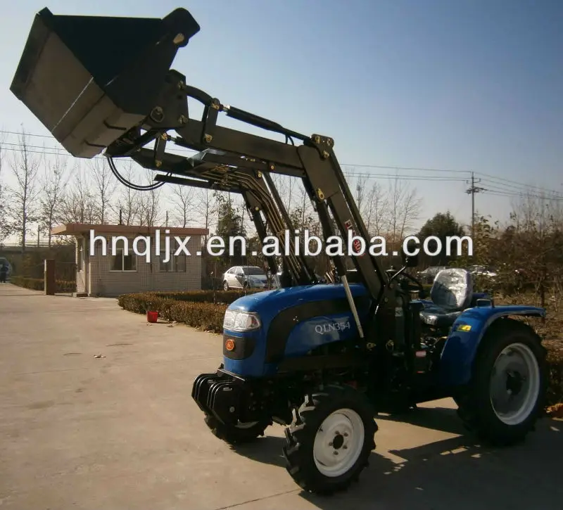 Compact Tractor With 4 Wheel Front End Loader And Backhoe Attachments