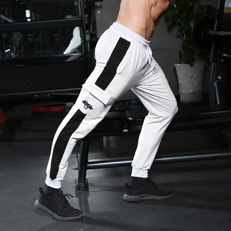 

New fashion men Running Slim fit Jogging pants Muscular man Splice Side stripe Breathable Sweatpants GYM Streetwear Track pants, Colors