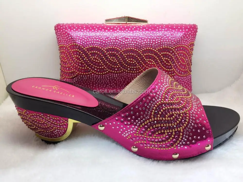 pink clutch bag and matching shoes