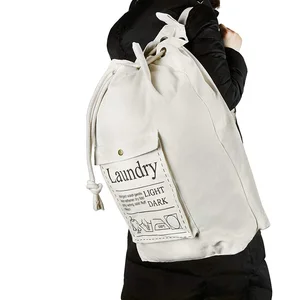 Image of Drawstring laundry basket with powerful adjustable shoulder strap wash storage bag