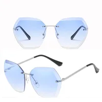 

DLL7741 New ocean film trendy glasses trimming ladies rimless metal sunglasses wholesale
